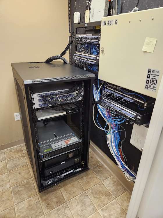 The finished wall-mounted rack in the new office