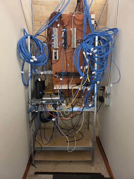 Gear on a plywood wall, cable run as it was needed