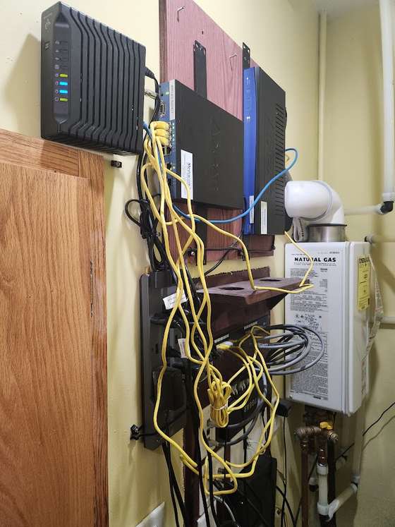 Equipment and cable hung wherever there was a screw